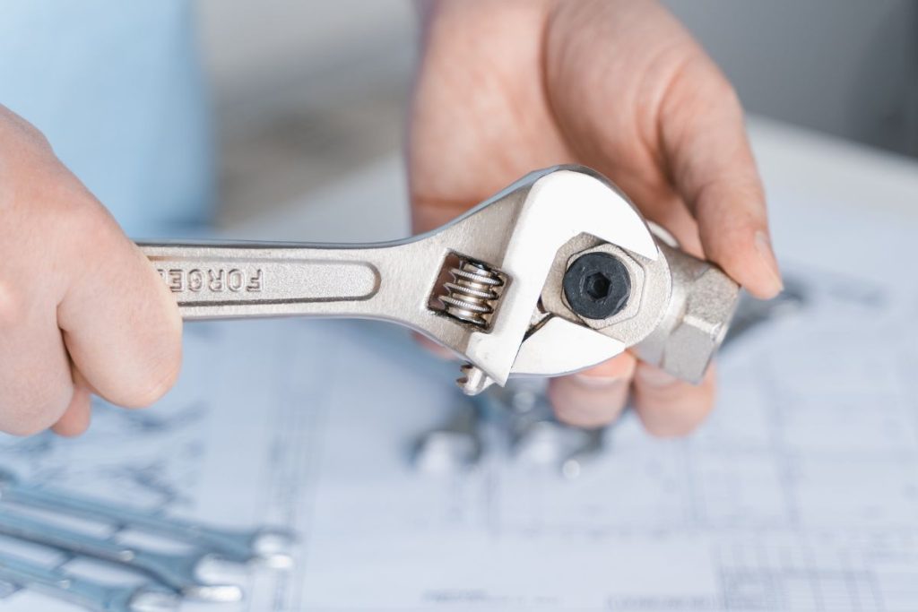 using an adjustable wrench